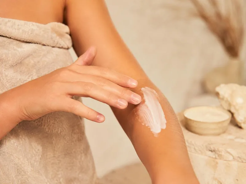 Applying mineral body cream